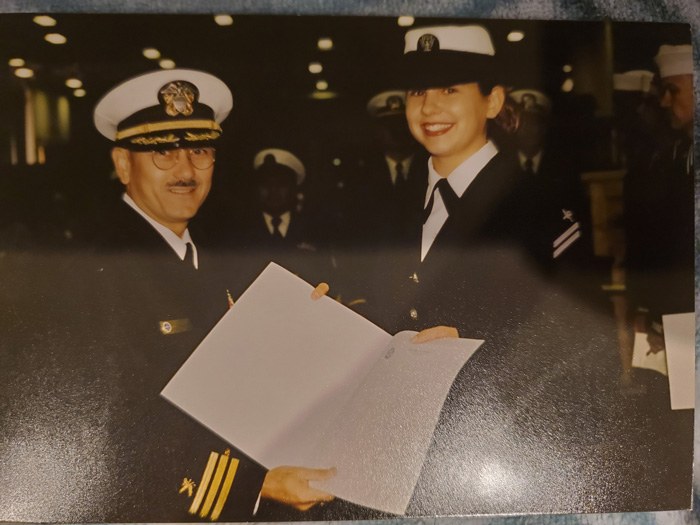 The author receiving an award in the Navy